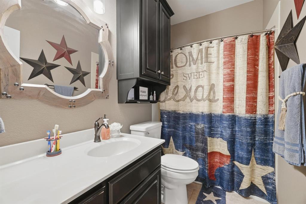 401 County Road 359, Unit B Merkel, TX 79536 - Photo 21 of 40 a bathroom with a sink toilet and shower