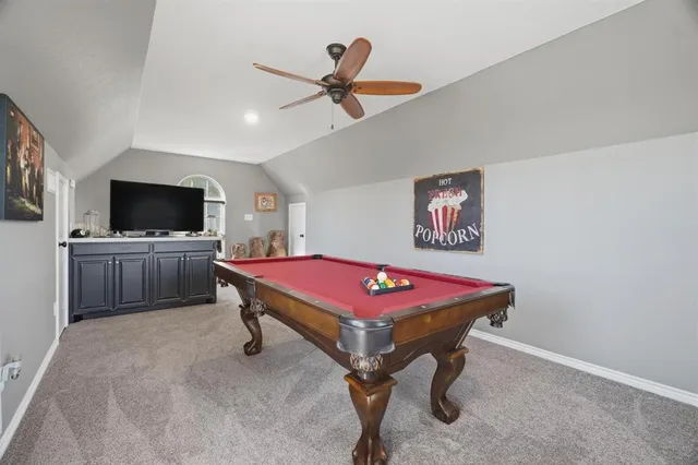 a room with furniture and flat screen tv