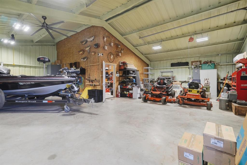 401 County Road 359, Unit B Merkel, TX 79536 - Photo 31 of 40 a view of a garage with furniture
