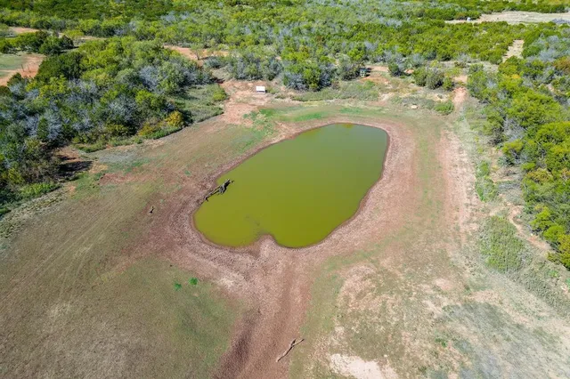 a view of a balcony with chairs