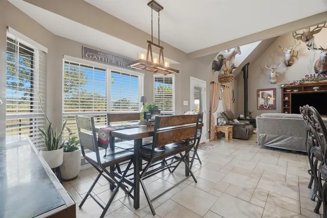 a view of a livingroom with furniture and window