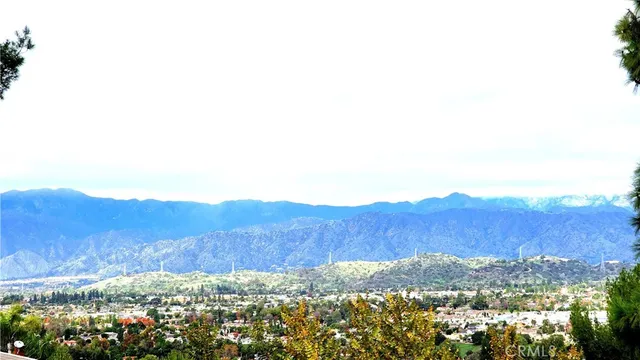 a view of an outdoor space with mountain view