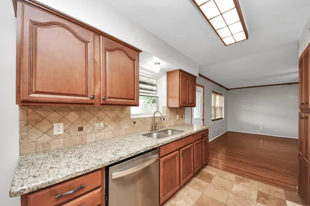 a bathroom with sink and mirror