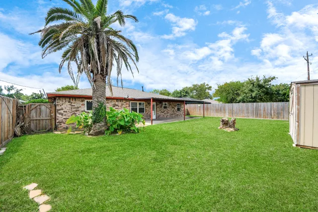 a garden view with a seating space