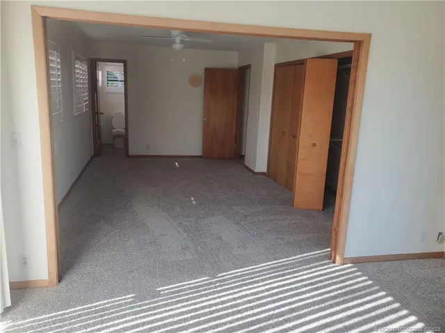 a view of a room with a large window