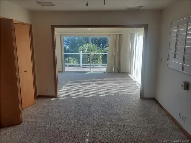 a bathroom with a sink a mirror and a shower