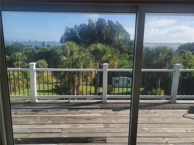 a view of a street from a balcony