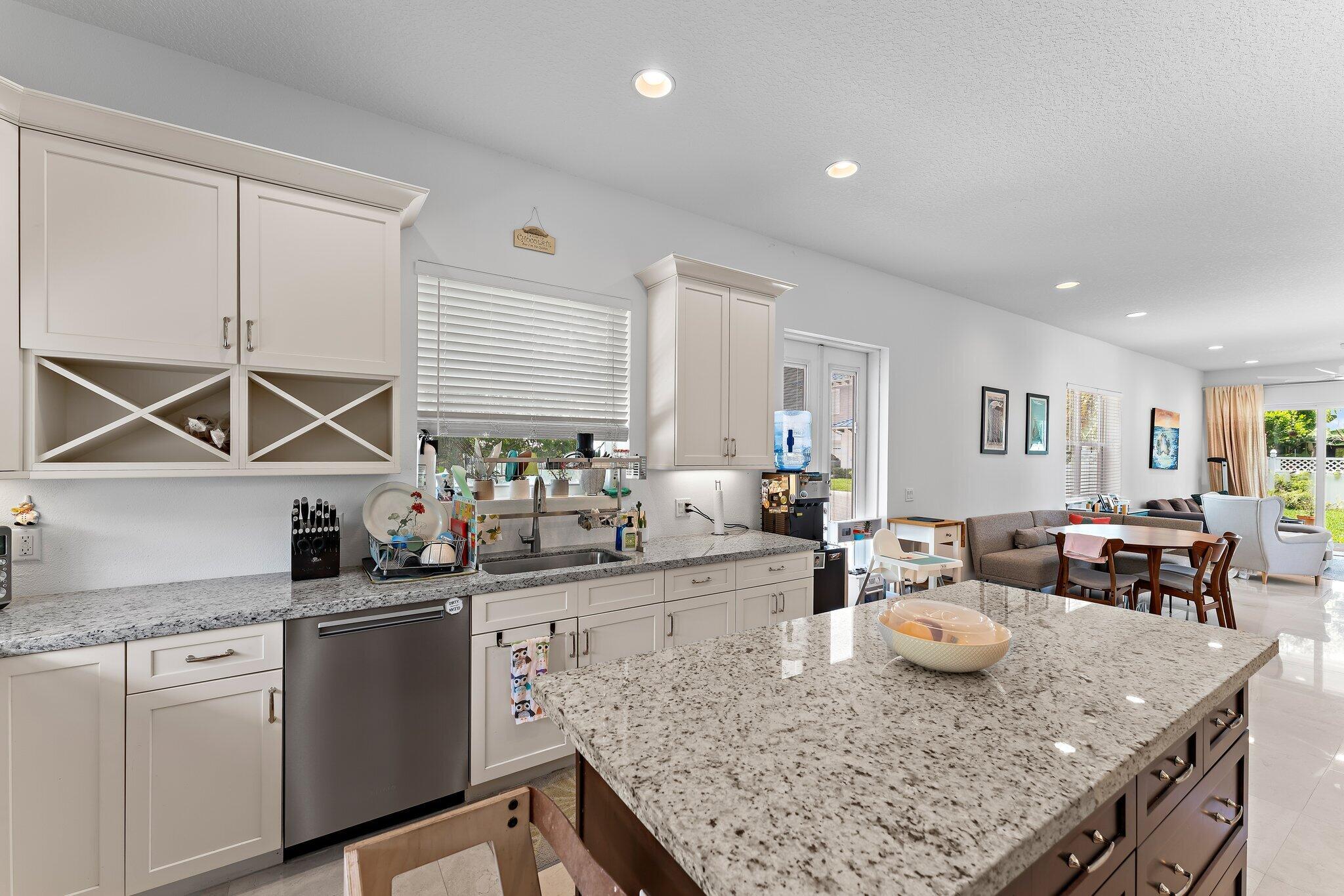 807 Xanadu Place Jupiter, FL 33477 - Photo 15 of 36 a kitchen with granite countertop lots of counter top space