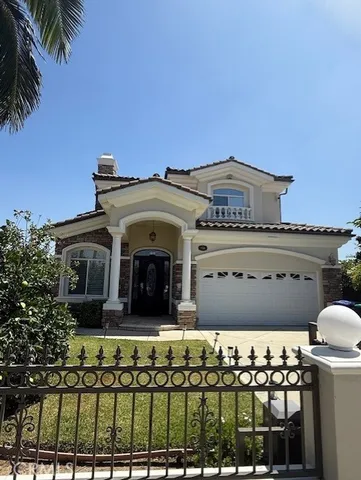 a front view of a house with balcony