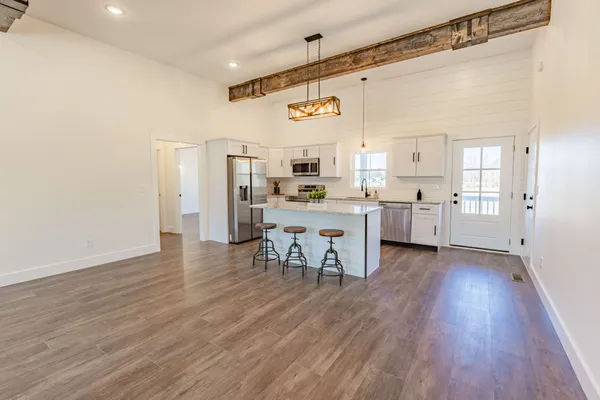 a view of a kitchen and dining room