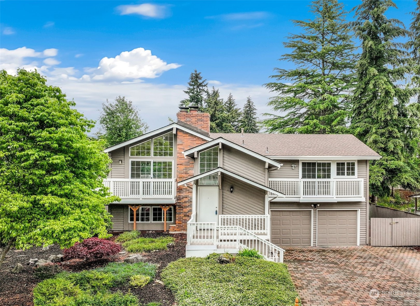 3672 Southwest 318th Street Federal Way, WA 98023 - Photo 1 of 40 a white house that has tree in front of it
