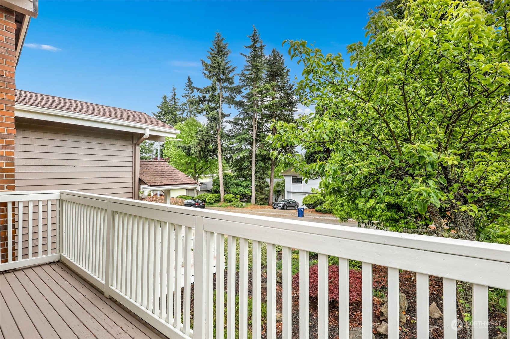 3672 Southwest 318th Street Federal Way, WA 98023 - Photo 18 of 40 a view of a balcony with wooden fence and floor