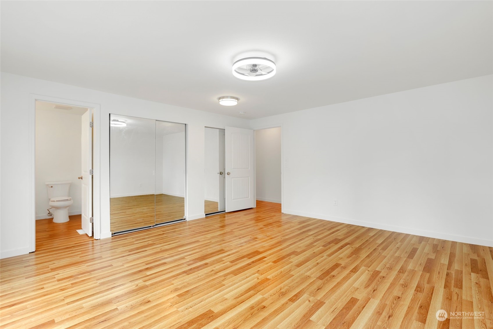 3672 Southwest 318th Street Federal Way, WA 98023 - Photo 19 of 40 a view of an empty room and wooden floor