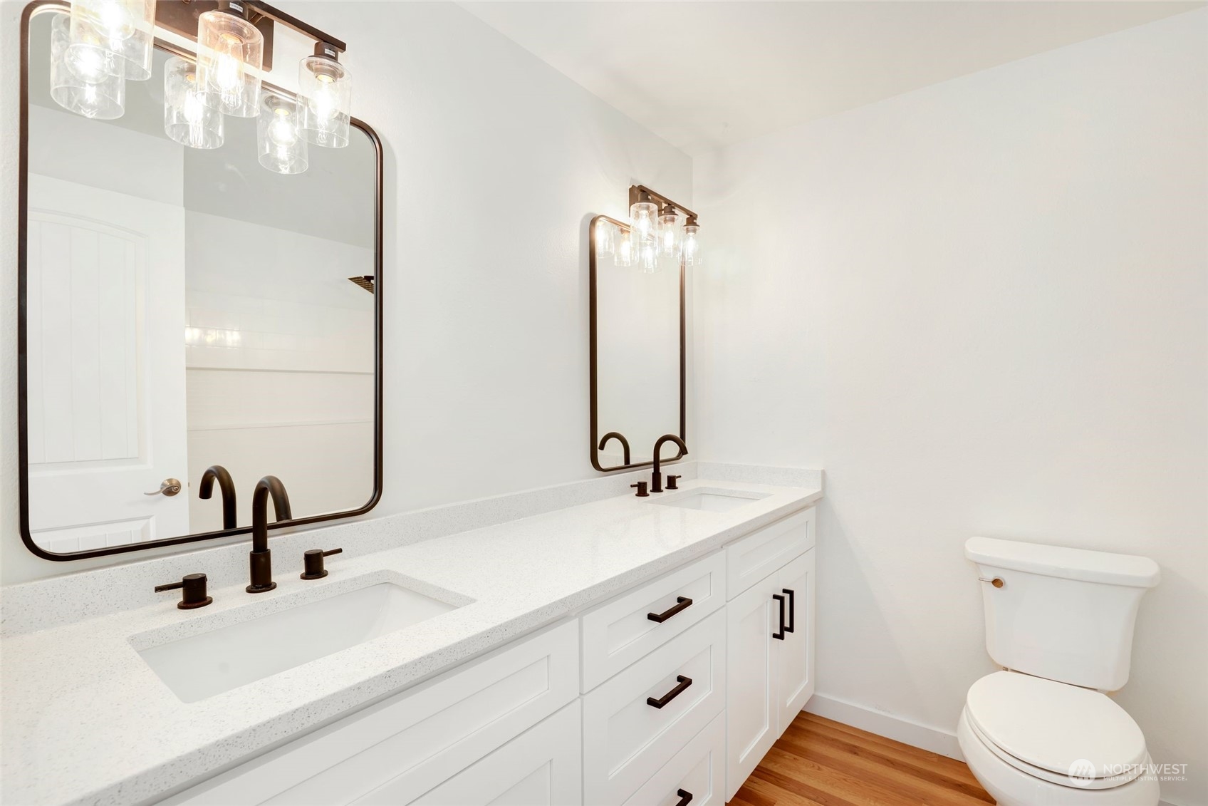 3672 Southwest 318th Street Federal Way, WA 98023 - Photo 20 of 40 a bathroom with a sink and a mirror
