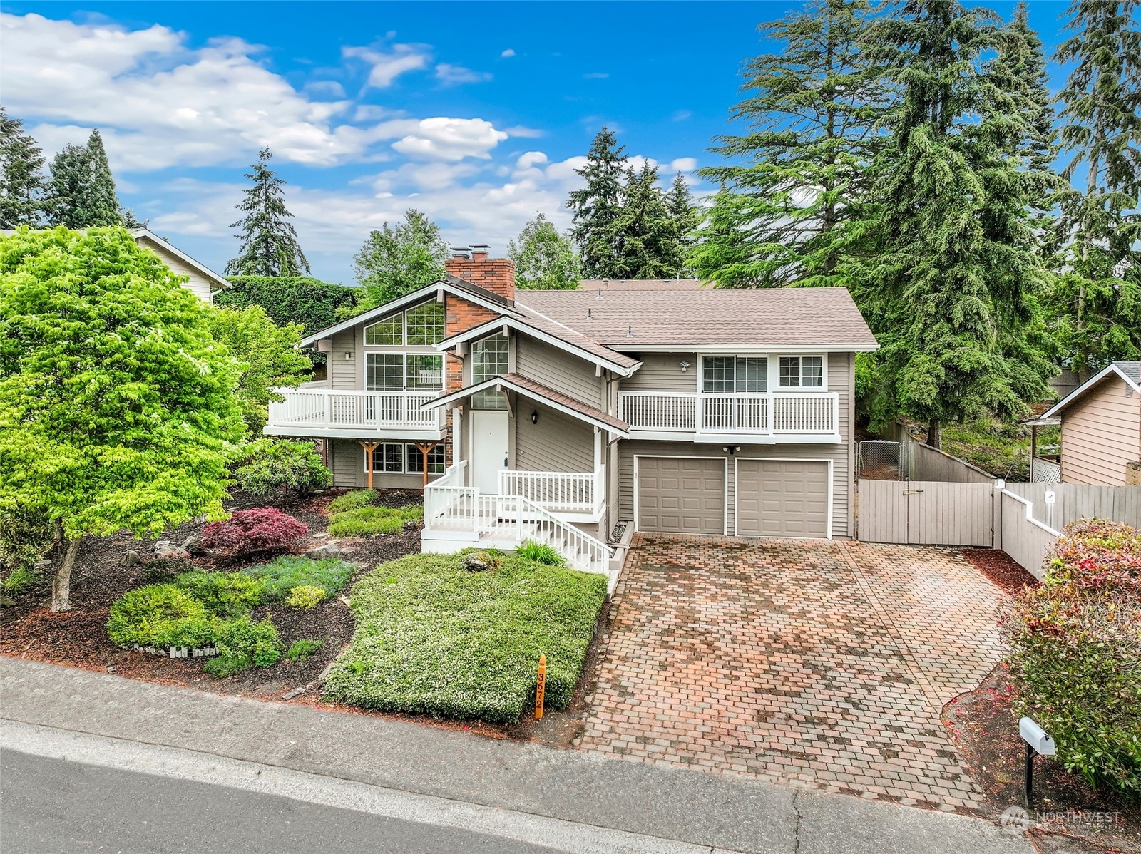 3672 Southwest 318th Street Federal Way, WA 98023 - Photo 2 of 40 a front view of a house with a yard