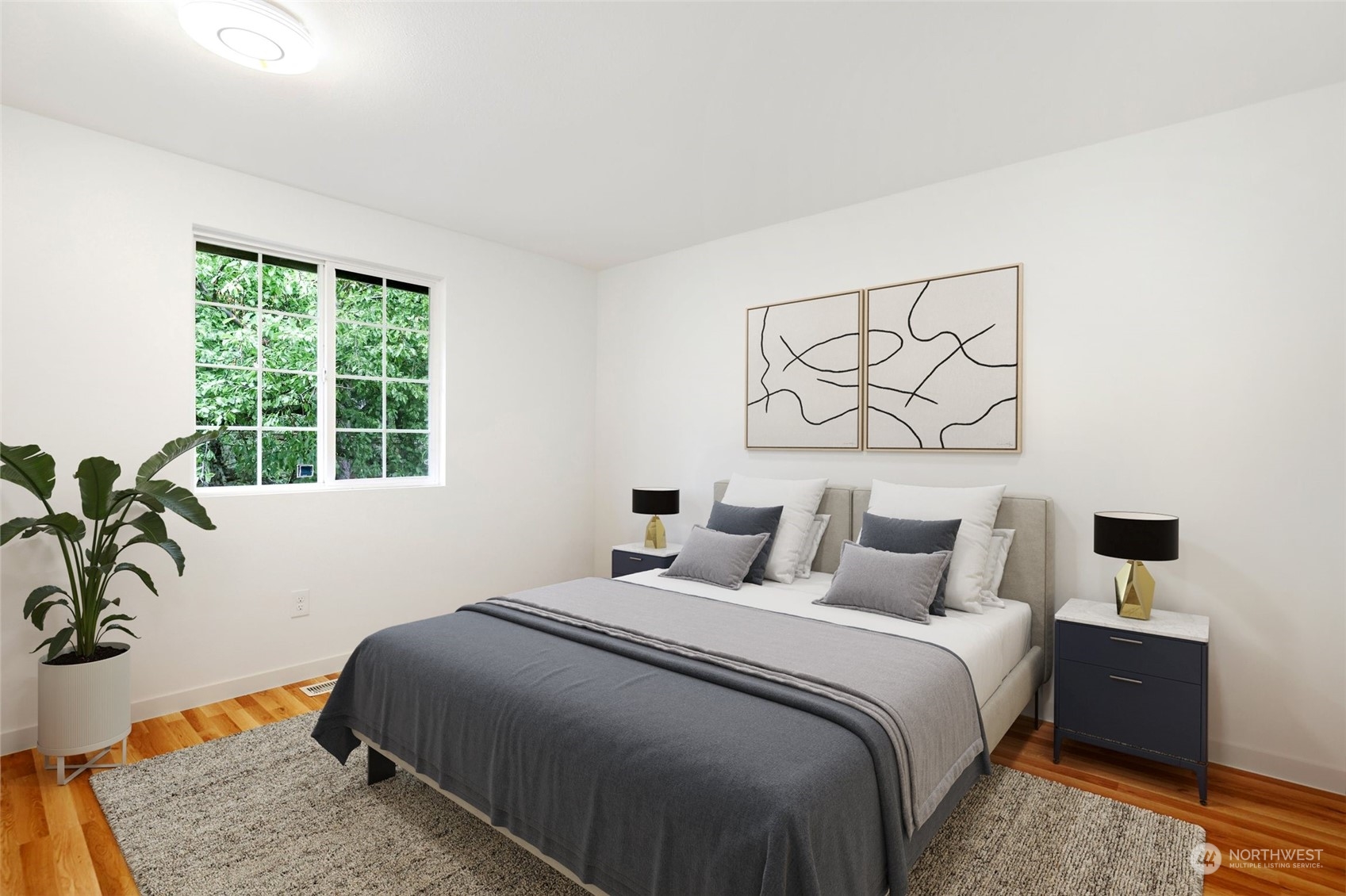 3672 Southwest 318th Street Federal Way, WA 98023 - Photo 22 of 40 a bedroom with a bed and a window
