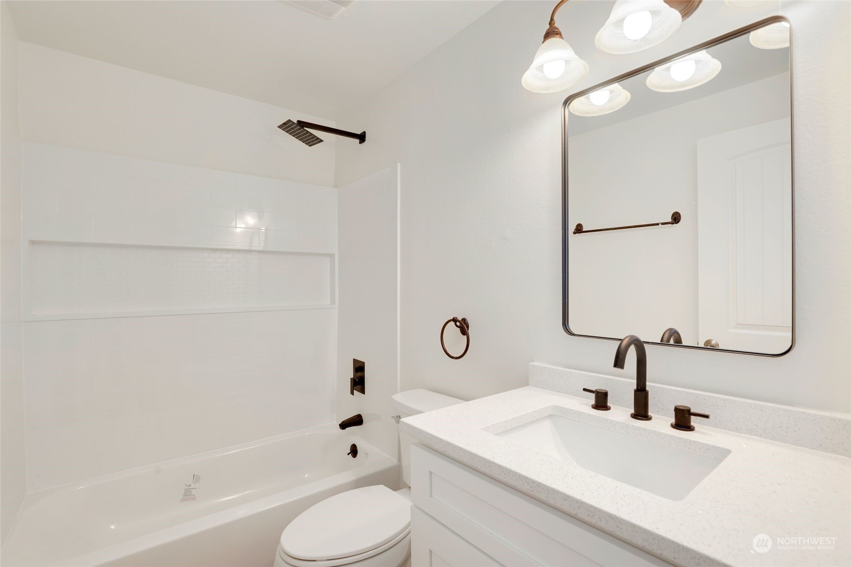 3672 Southwest 318th Street Federal Way, WA 98023 - Photo 24 of 40 a bathroom with a sink a toilet and shower