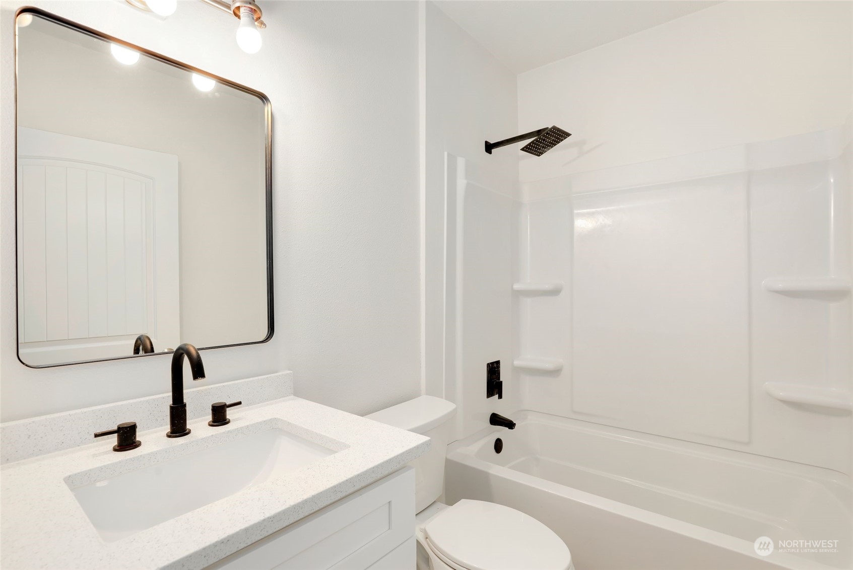 3672 Southwest 318th Street Federal Way, WA 98023 - Photo 29 of 40 a bathroom with a sink toilet and shower