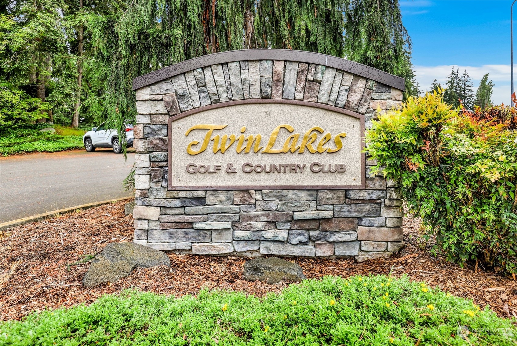 3672 Southwest 318th Street Federal Way, WA 98023 - Photo 38 of 40 a sign on the side of a road