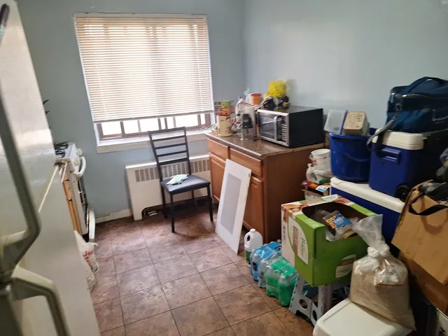 a workspace with furniture and a window