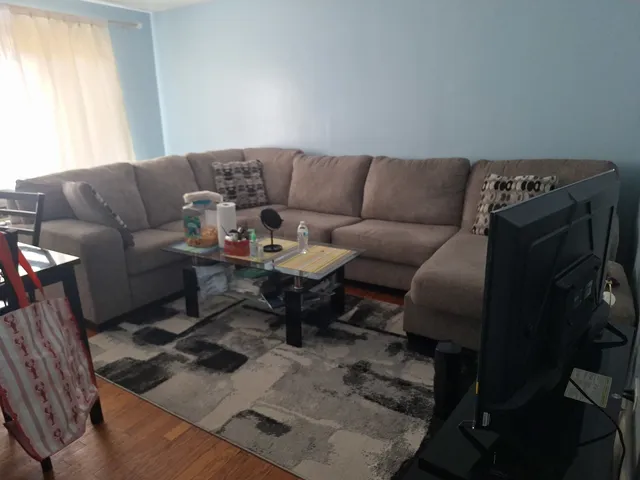 a living room with furniture and a couch