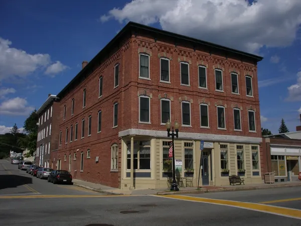 a front view of a building with street view