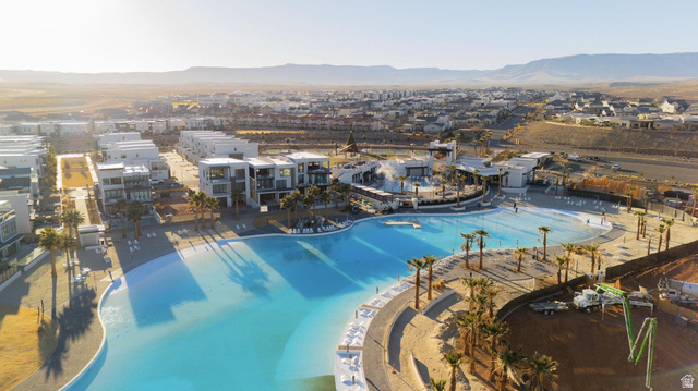 488 West Greenstone Pl Street, Unit 1010 St. George, UT 84790 - Photo 5 of 34 Expansive community lagoon with surrounding residences, resort-style amenities, and distant mountain ranges