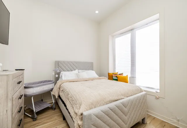 a utility room with sink dryer and washer