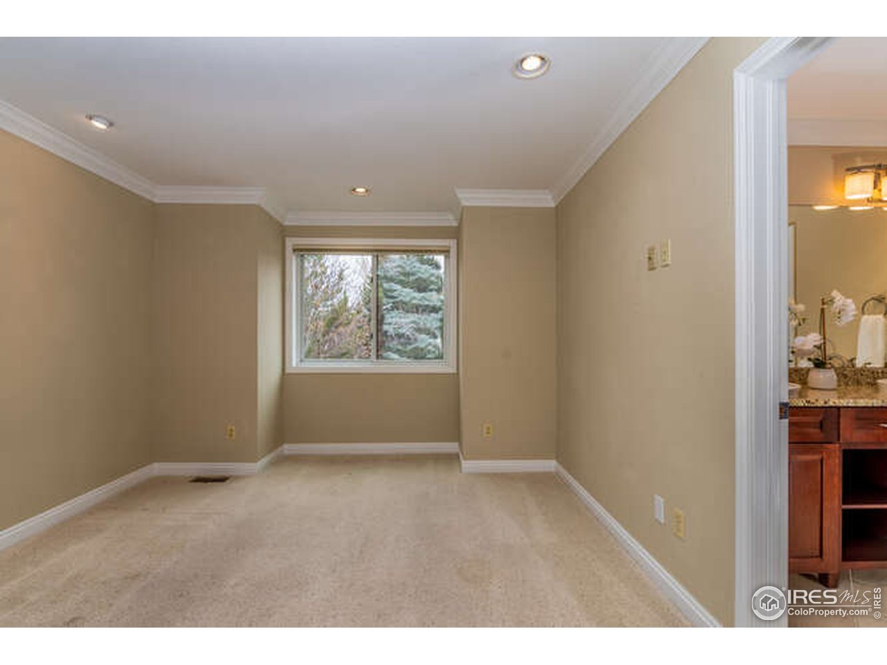 7177 Four Rivers Road Boulder, CO 80301 - Photo 23 of 32 a view of an empty room with a window