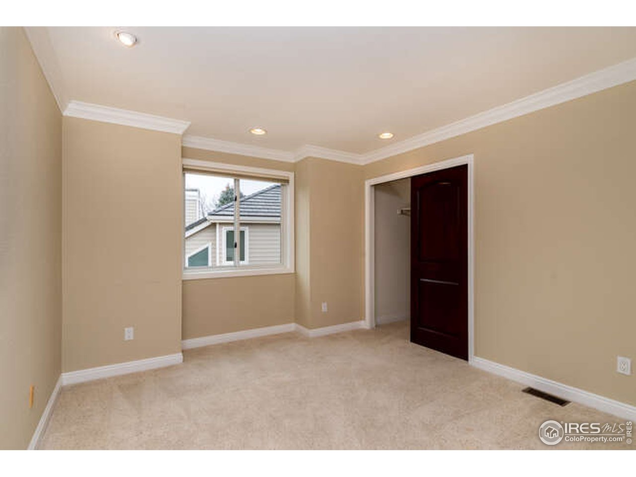 7177 Four Rivers Road Boulder, CO 80301 - Photo 26 of 32 a view of an empty room with a window