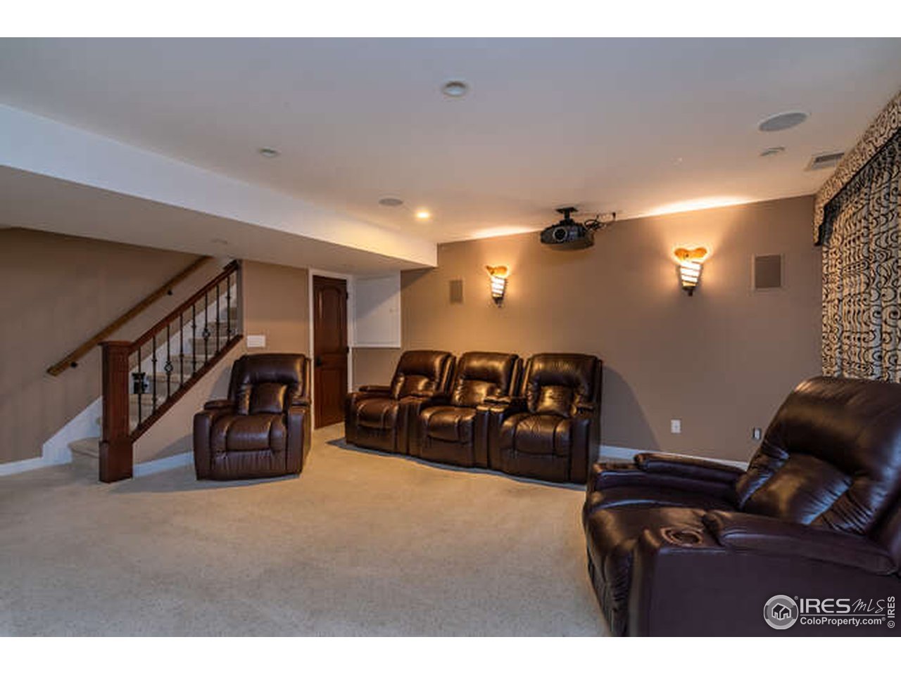 7177 Four Rivers Road Boulder, CO 80301 - Photo 28 of 32 a living room with furniture and a ceiling fan