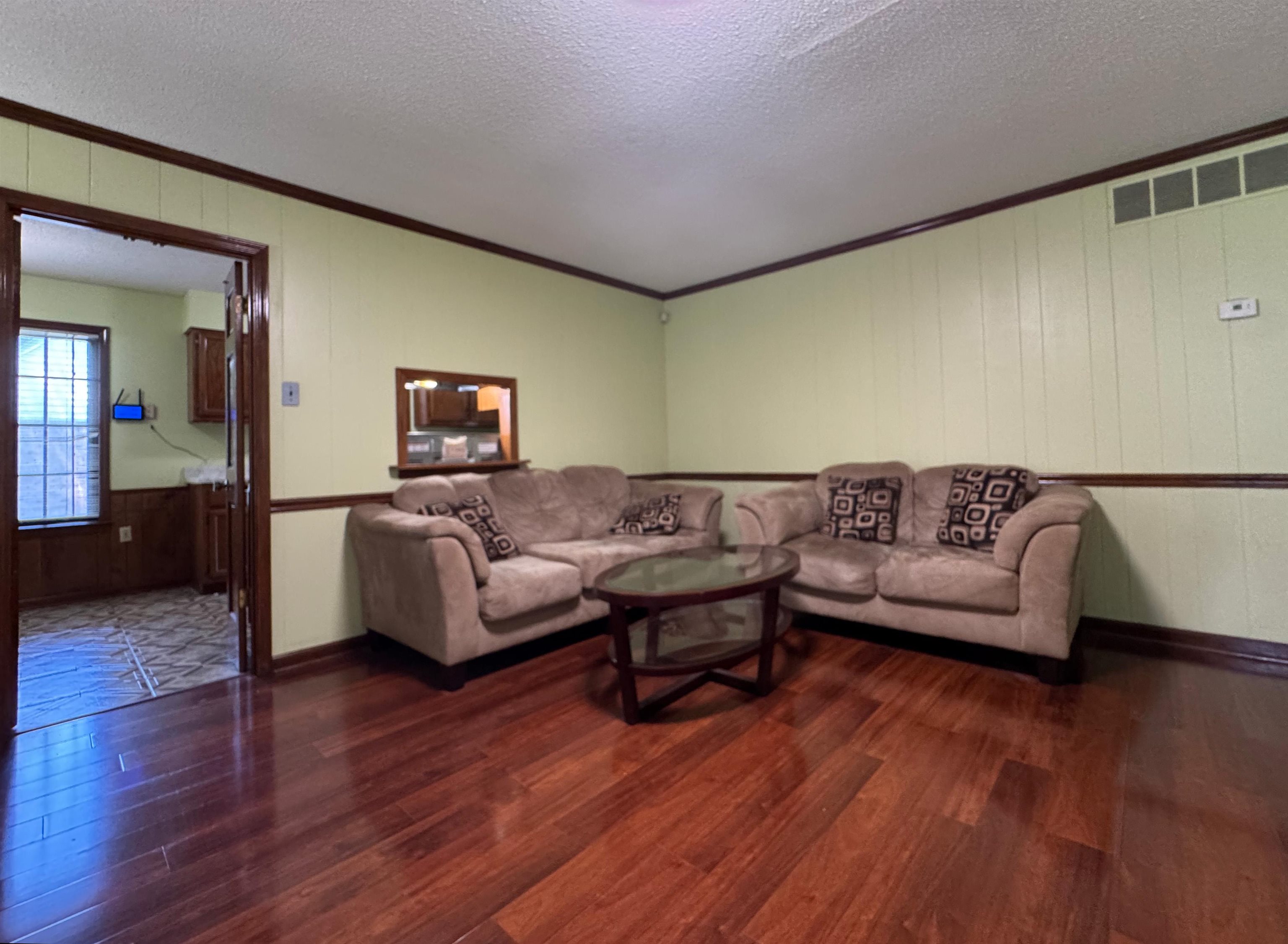 3213 Covington Pike Memphis, TN 38128 - Photo 2 of 17 a living room with couches and a coffee table