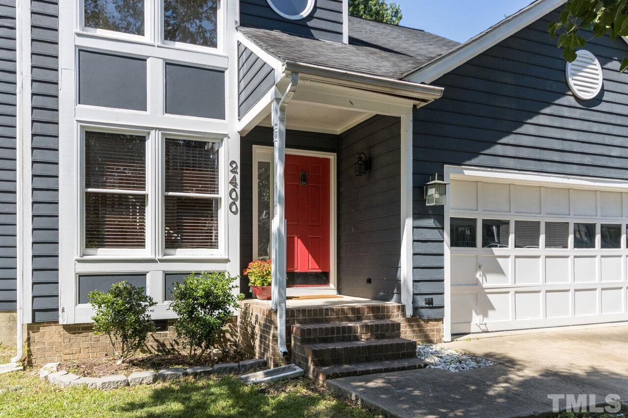 2400 Long And Winding Road Raleigh, NC 27603 - Photo 2 of 29 a view of brick house with large windows