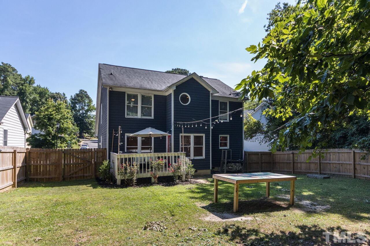 2400 Long And Winding Road Raleigh, NC 27603 - Photo 29 of 29 a view of a house with backyard and sitting area