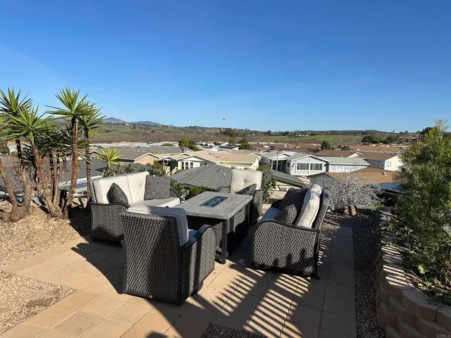 a view of a city with an ocean view