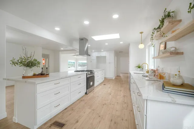 a kitchen with sink cabinets and counter space