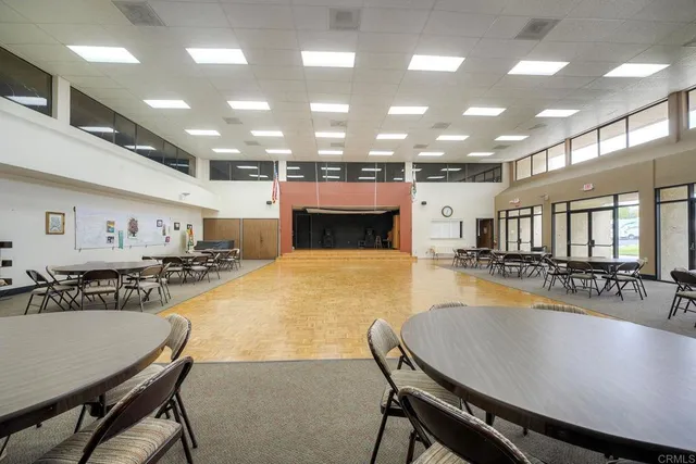 a view of a workspace with furniture