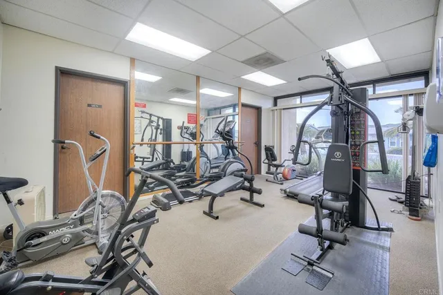 a large room with table and chairs