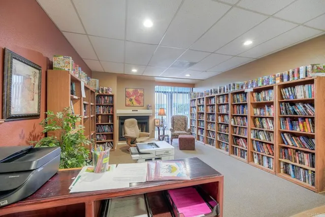 a view of a dining room with furniture and a livingroom