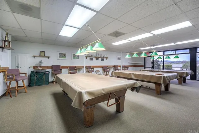 a view of a livingroom with furniture and a fireplace