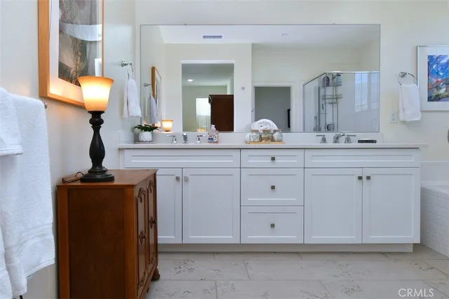 a view of a house with patio and swimming pool