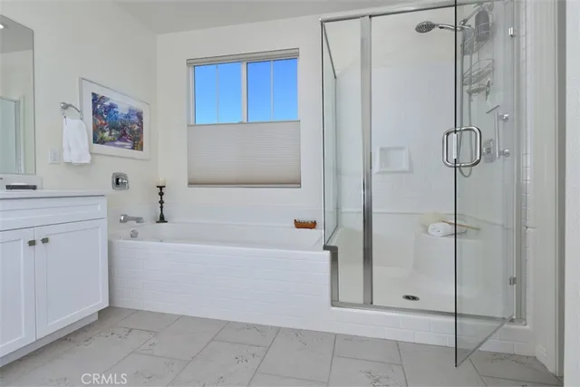 a view of a swimming pool with a lounge chairs