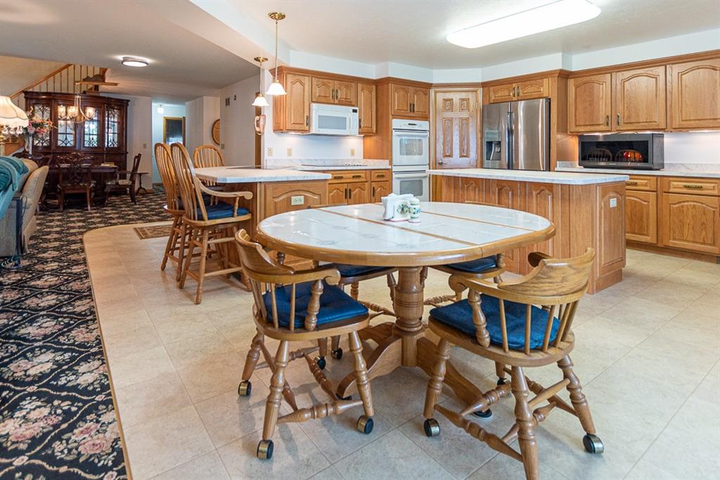 910 Latonka Drive Mercer, PA 16137 - Photo 20 of 38 a view of a dining room with furniture and wooden floor
