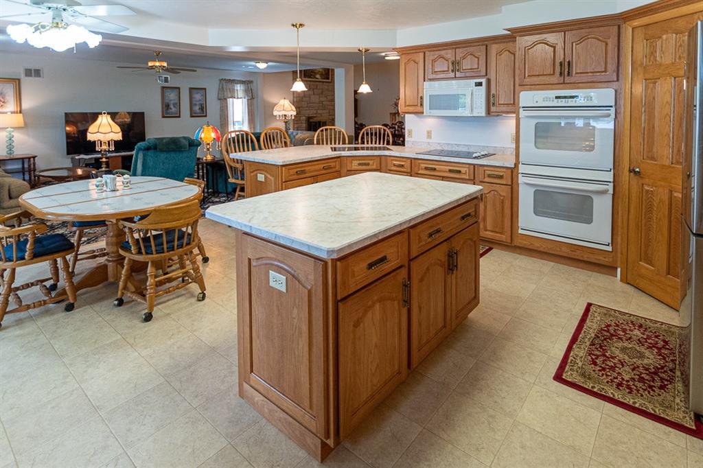 910 Latonka Drive Mercer, PA 16137 - Photo 22 of 38 a kitchen with stainless steel appliances granite countertop a refrigerator a sink and a stove