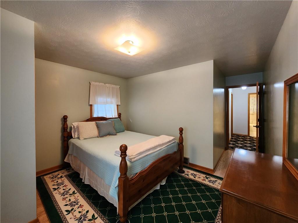 910 Latonka Drive Mercer, PA 16137 - Photo 26 of 38 a bed sitting in a bedroom next to a window