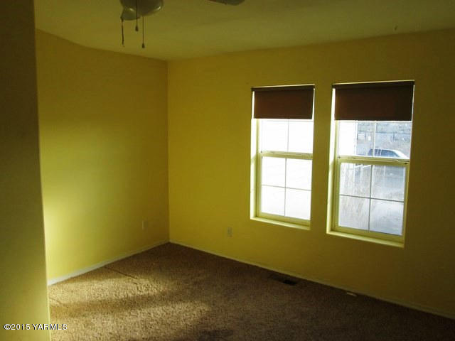 173401 West Johnson Road Grandview, WA 98930 - Photo 19 of 38 a view of an empty room with a window