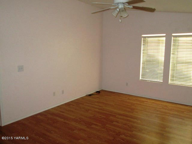 173401 West Johnson Road Grandview, WA 98930 - Photo 31 of 38 a view of an empty room with a window