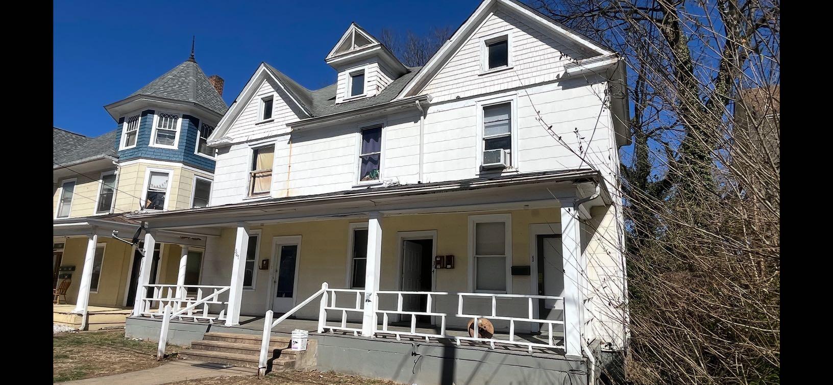 front view of a house with a small yard