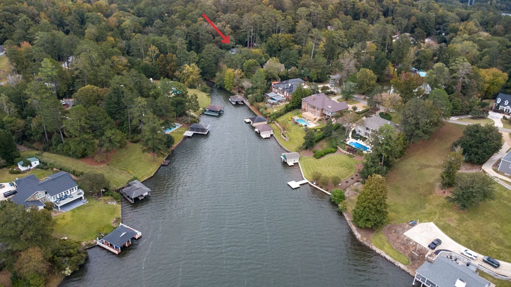 222 Cascade Road Columbus, GA 31904 - Photo 5 of 7 an aerial view of a house with a yard and lake view