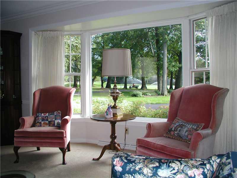427 A Three Degree Road Butler, PA 16002 - Photo 4 of 25 Living Room. That is the 14th fairway and green in the background. A grid for the large window is in storage and available.